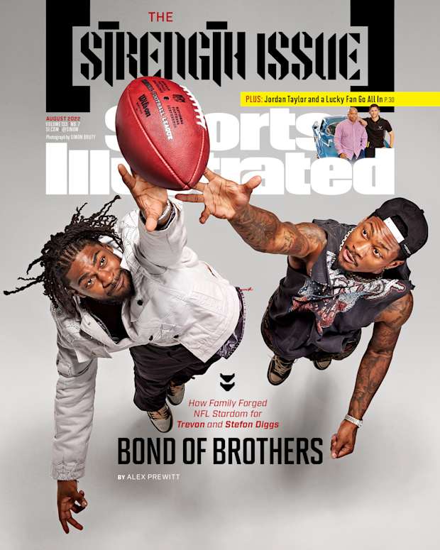 Trevon and Stefon Diggs leap for a football on the cover of the Sports Illustrated August 2022 issue